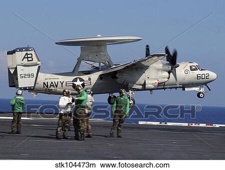 An E-2C Hawkeye launches from aboard USS Enterprise. View Large Photo Image Picture - An E-2C Hawkeye launches from aboard USS Enterprise.. Fotosearch