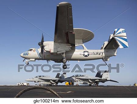 Picture - An E-2C Hawkeye makes an arrested landing aboard USS Dwight D. Eisenhower.. Fotosearch