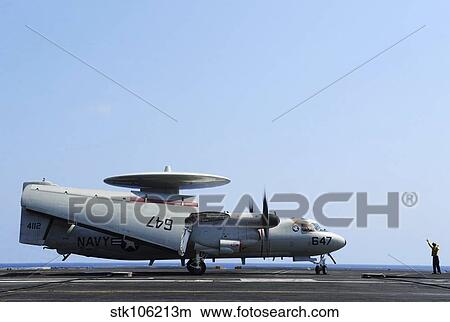 Picture - An E-2C Hawkeye on the flight deck of USS George H. W. Bush.. Fotosearch