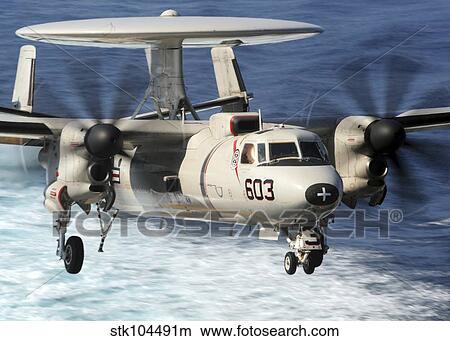 An E-2C Hawkeye prepares for landing. View Large Photo Image Picture - An E-2C Hawkeye prepares for landing.. Fotosearch