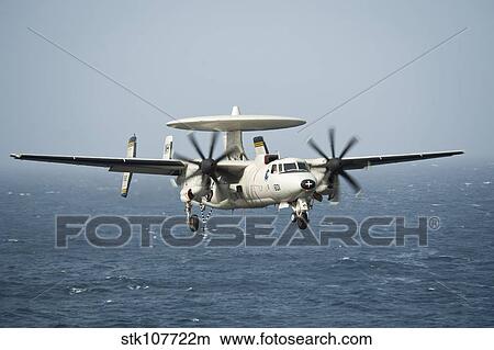 An E-2C Hawkeye prepares for landing. View Large Photo Image Picture - An E-2C Hawkeye prepares for landing.. Fotosearch