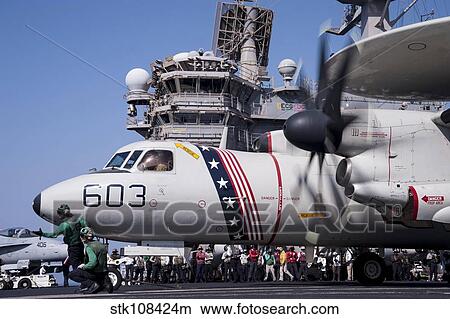 An E-2C Hawkeye prepares to launch from the flight deck of USS George H. W. Bush. View Large Photo Image Picture - An E-2C Hawkeye prepares to launch from the flight deck of USS George H. W. Bush.. Fotosearch