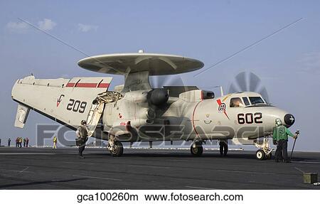 An E-2C Hawkeye ready to launch from the deck of USS George H. W. Bush. View Large Photo Image Picture - An E-2C Hawkeye ready to launch from the deck of USS George H. W. Bush.. Fotosearch
