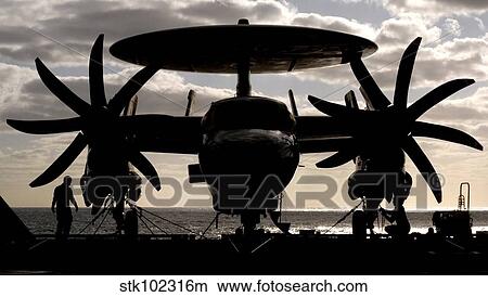 An E-2C Hawkeye secured to the flight deck of USS Harry S. Truman. View Large Photo Image Picture - An E-2C Hawkeye secured to the flight deck of USS Harry S. Truman.. Fotosearch