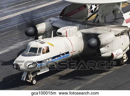 An E-2C Hawkeye sits ready aboard USS Harry S. Truman View Large Photo Image Picture - An E-2C Hawkeye sits ready aboard USS Harry S. Truman. Fotosearch