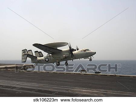 An E-2C Hawkeye takes off from the flight deck of USS Enterprise. View Large Photo Image Picture - An E-2C Hawkeye takes off from the flight deck of USS Enterprise.. Fotosearch
