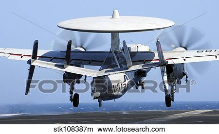 An E-2C Hawkeye takes off from the flight deck of USS George Washington. View Large Photo Image Picture - An E-2C Hawkeye takes off from the flight deck of USS George Washington.. Fotosearch