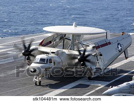 An E-2C Hawkeye taxiing on the flight deck aboard USS Dwight D. Eisenhower. View Large Photo Image Picture - An E-2C Hawkeye taxiing on the flight deck aboard USS Dwight D. Eisenhower.. Fotosearch