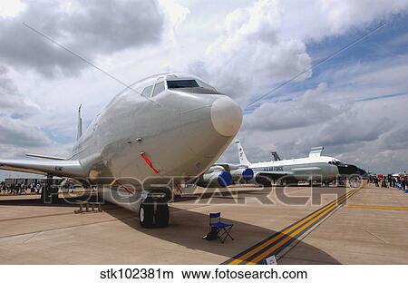 Picture - An E-8C Joint Surveillance Target Attack Radar System (Joint STARS) and a RC-135V/W Rivet Joint aircraft.. Fotosearch