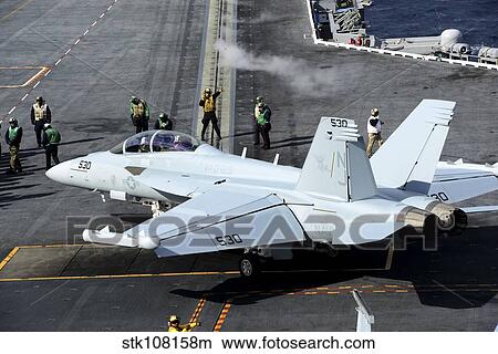 An EA-18B Growler taxis onto a catapult aboard USS Carl Vinson. View Large Photo Image Picture - An EA-18B Growler taxis onto a catapult aboard USS Carl Vinson.. Fotosearch