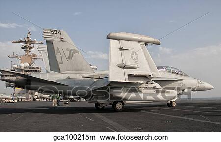 An EA-18G Growler aboard USS George H. W. Bush. View Large Photo Image Picture - An EA-18G Growler aboard USS George H. W. Bush.. Fotosearch