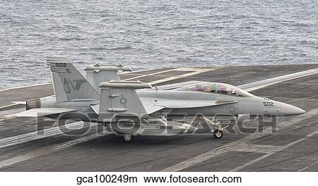 An EA-18G Growler aboard USS George H. W. Bush. View Large Photo Image Picture - An EA-18G Growler aboard USS George H. W. Bush.. Fotosearch