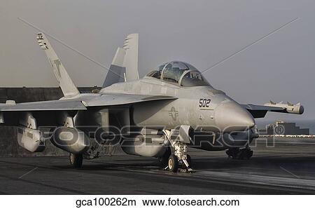 An EA-18G Growler aboard USS George H. W. Bush. View Large Photo Image Picture - An EA-18G Growler aboard USS George H. W. Bush.. Fotosearch