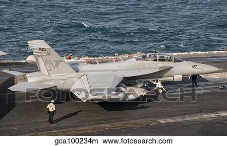 Picture - An EA-18G Growler is ready for a mission aboard USS George H. W. Bush.. Fotosearch