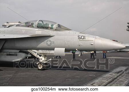 An EA-18G Growler is ready for a mission aboard USS George H. W. Bush. View Large Photo Image Picture - An EA-18G Growler is ready for a mission aboard USS George H. W. Bush.. Fotosearch