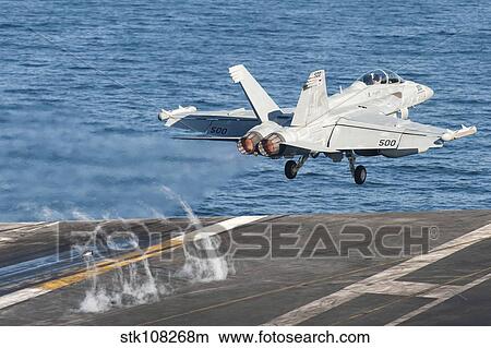 An EA-18G Growler launches from the flight deck of USS Harry S. Truman. View Large Photo Image Picture - An EA-18G Growler launches from the flight deck of USS Harry S. Truman.. Fotosearch