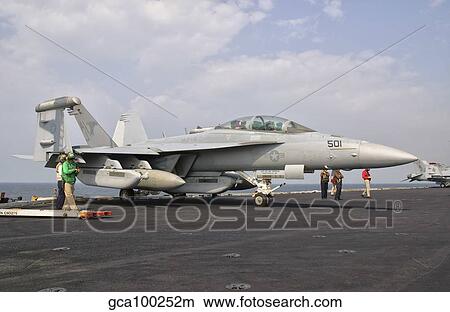 An EA-18G Growler ready for a mission aboard USS George H. W. Bush. View Large Photo Image Picture - An EA-18G Growler ready for a mission aboard USS George H. W. Bush.. Fotosearch