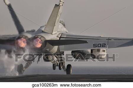 An EA-18G Growler taking off from USS George H. W. Bush. View Large Photo Image Picture - An EA-18G Growler taking off from USS George H. W. Bush.. Fotosearch