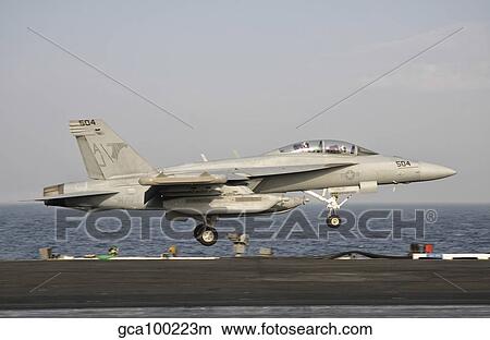 An EA-18G taking off from the flight deck of USS George H. W. Bush. View Large Photo Image Picture - An EA-18G taking off from the flight deck of USS George H. W. Bush.. Fotosearch