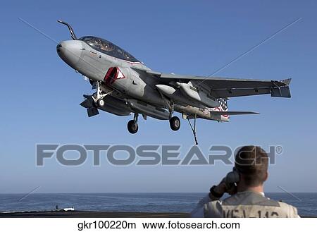An EA-6B Prowler comes in for an arrested landing aboard USS Dwight D. Eisenhower. View Large Photo Image Picture - An EA-6B Prowler comes in for an arrested landing aboard USS Dwight D. Eisenhower.. Fotosearch