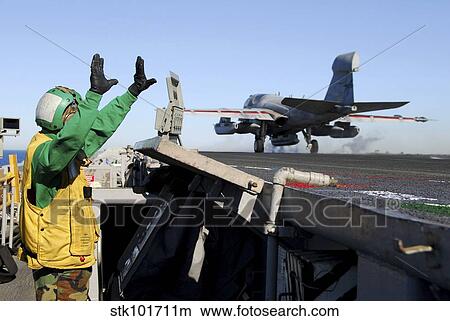 An EA-6B Prowler launches from the flight deck aboard USS Nimitz. View Large Photo Image Picture - An EA-6B Prowler launches from the flight deck aboard USS Nimitz.. Fotosearch