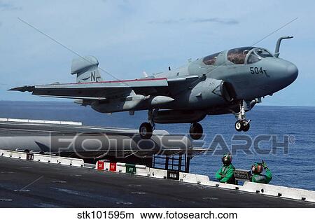 An EA-6B Prowler launches off the flight deck of USS Kitty Hawk. View Large Photo Image Picture - An EA-6B Prowler launches off the flight deck of USS Kitty Hawk.. Fotosearch