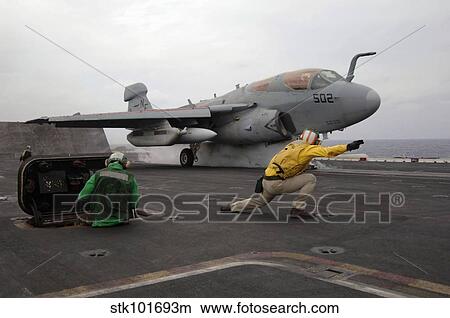 An EA-6B Prowler launches off the flight deck of USS Kitty Hawk. View Large Photo Image Picture - An EA-6B Prowler launches off the flight deck of USS Kitty Hawk.. Fotosearch