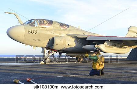 An EA-6B Prowler prepares to launch from the flight deck of USS Ronald Reagan. View Large Photo Image Picture - An EA-6B Prowler prepares to launch from the flight deck of USS Ronald Reagan.. Fotosearch