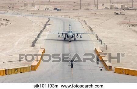 An EA-6B Prowler taxis to the hangar. View Large Photo Image Picture - An EA-6B Prowler taxis to the hangar.. Fotosearch