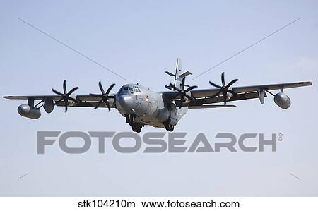 An EC-130J Commando Solo aircraft prepares to land. View Large Photo Image Picture - An EC-130J Commando Solo aircraft prepares to land.. Fotosearch