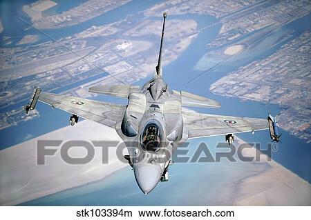 An Emirati F-16 conducts a training mission during a multinational exercise. View Large Photo Image Picture - An Emirati F-16 conducts a training mission during a multinational exercise.. Fotosearch
