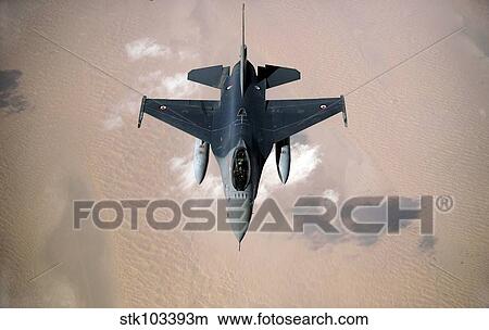 An Emirati F-16 disconnects from a KC-10A Extender after refueling during a multinational exercise. View Large Photo Image Picture - An Emirati F-16 disconnects from a KC-10A Extender after refueling during a multinational exercise.. Fotosearch