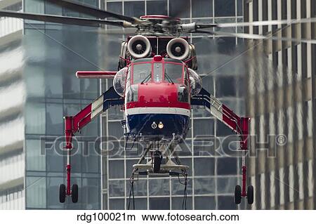 An Erickson Aircrane S-64 Aircrane heavy-lift helicopter. View Large Photo Image Picture - An Erickson Aircrane S-64 Aircrane heavy-lift helicopter.. Fotosearch