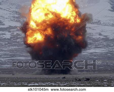 An explosion of more than 1, 000 pounds of explosives light up the sky. View Large Photo Image Picture - An explosion of more than 1, 000 pounds of explosives light up the sky.. Fotosearch