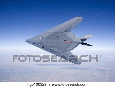 An F-117 Nighthawk flies a training sortie over New Mexico. View Large Photo Image Picture - An F-117 Nighthawk flies a training sortie over New Mexico.. Fotosearch