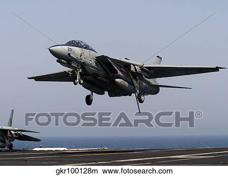 An F-14D Tomcat comes in for an arrested landing on the flight deck of USS Theodore Roosevelt. View Large Photo Image Picture - An F-14D Tomcat comes in for an arrested landing on the flight deck of USS Theodore Roosevelt.. Fotosearch