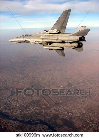 An F-14D Tomcat conducts a mission over Northern Iraq. View Large Photo Image Picture - An F-14D Tomcat conducts a mission over Northern Iraq.. Fotosearch
