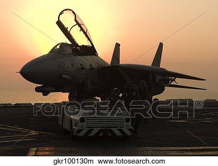 An F-14D Tomcat on the flight deck of USS Theodore Roosevelt. View Large Photo Image Picture - An F-14D Tomcat on the flight deck of USS Theodore Roosevelt.. Fotosearch