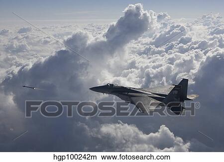 An F-15 Eagle fires an AIM-9X missile. View Large Photo Image Picture - An F-15 Eagle fires an AIM-9X missile.. Fotosearch