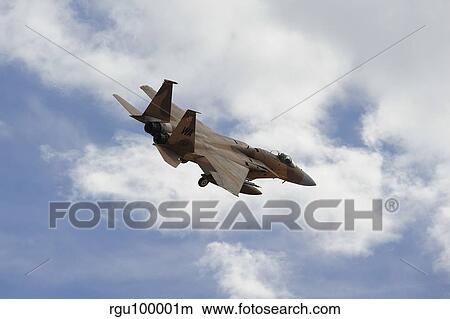 An F-15 Eagle of the 65th Aggressor Squadron prepares for landing. View Large Photo Image Picture - An F-15 Eagle of the 65th Aggressor Squadron prepares for landing.. Fotosearch