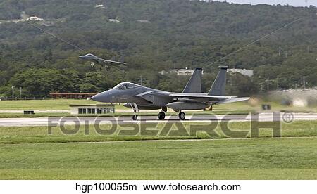 An F-15 takes off from Kadena Air Base, Okinawa, Japan. View Large Photo Image Picture - An F-15 takes off from Kadena Air Base, Okinawa, Japan.. Fotosearch