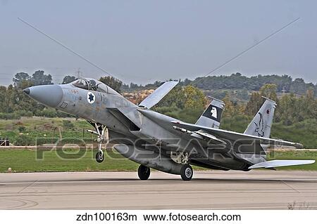 An F-15A Baz of the Israeli Air Force landing at Tel-Nof Air Force Base. View Large Photo Image Picture - An F-15A Baz of the Israeli Air Force landing at Tel-Nof Air Force Base.. Fotosearch