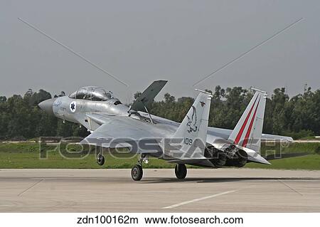 An F-15B Baz of the Israeli Air Force landing at Tel-Nof Air Force Base. View Large Photo Image Picture - An F-15B Baz of the Israeli Air Force landing at Tel-Nof Air Force Base.. Fotosearch