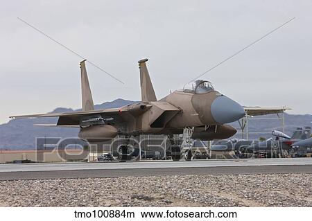 An F-15C Eagle taxis to the runway at Nellis Air Force Base, Nevada. View Large Photo Image Picture - An F-15C Eagle taxis to the runway at Nellis Air Force Base, Nevada.. Fotosearch