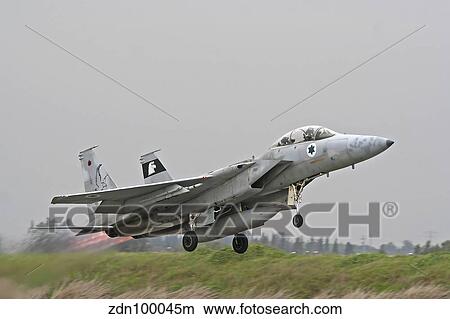 An F-15D Baz of the Israeli Air Force taking off from Tel Nof Air Base. View Large Photo Image Picture - An F-15D Baz of the Israeli Air Force taking off from Tel Nof Air Base.. Fotosearch