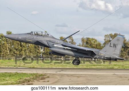 An F-15E Strike Eagle deploys from Decimomannu Air Base, Italy. View Large Photo Image Picture - An F-15E Strike Eagle deploys from Decimomannu Air Base, Italy.. Fotosearch