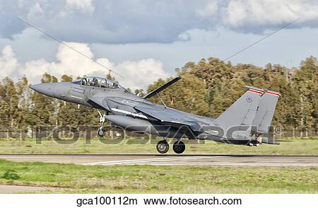 An F-15E Strike Eagle deploys from Decimomannu Air Base, Italy. View Large Photo Image Picture - An F-15E Strike Eagle deploys from Decimomannu Air Base, Italy.. Fotosearch