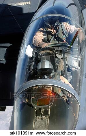 An F-15E Strike Eagle is refueled by a KC-135 Stratotanker. View Large Photo Image Picture - An F-15E Strike Eagle is refueled by a KC-135 Stratotanker.. Fotosearch