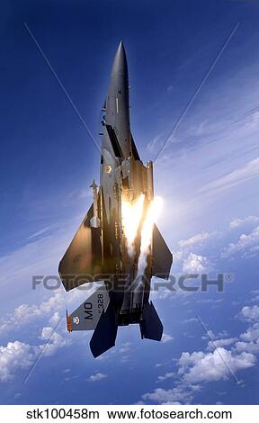 An F-15E Strike Eagle pops flares. View Large Photo Image Picture - An F-15E Strike Eagle pops flares.. Fotosearch