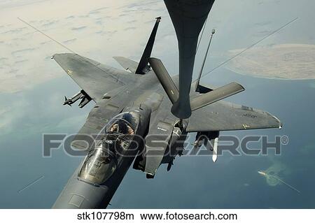Picture - An F-15E Strike Eagle receives fuel from a KC-135R Stratotanker.. Fotosearch